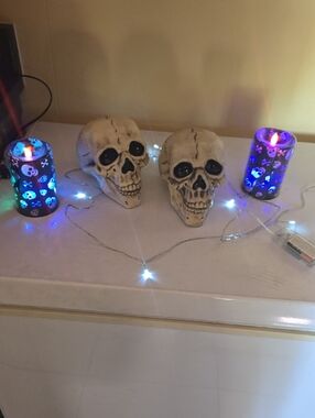 Decorative Skull Accent Pair - 2 Light Changing Candles and 1 String of lights.